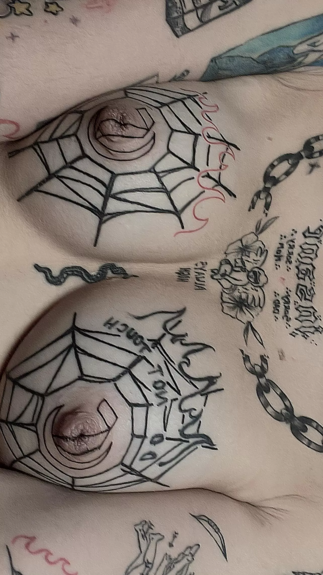 tattooed tits:)