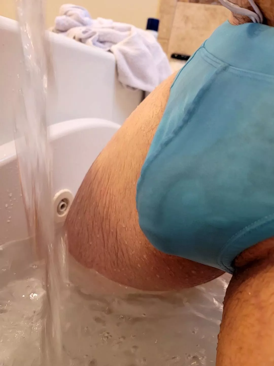 The wet blue speedo again.