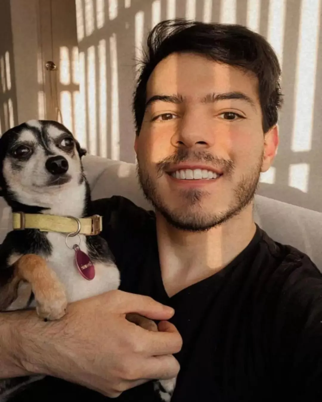 this is me and my dog Brownie, he's happy I just finished elder ring so I have more free time with him.