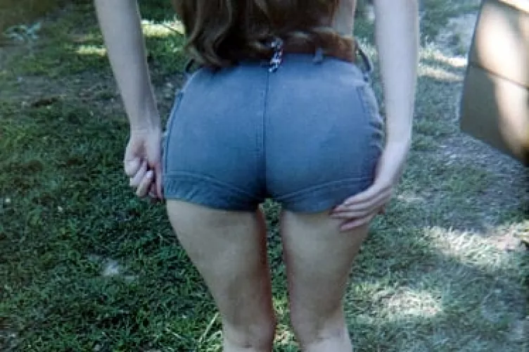 Vintage '70s look - short shorts and long hair....