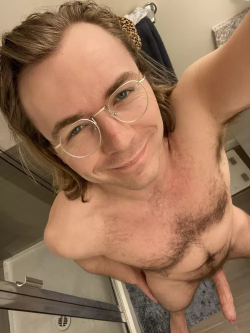 Wearing my two favorite things, a smile and a rock hard cock