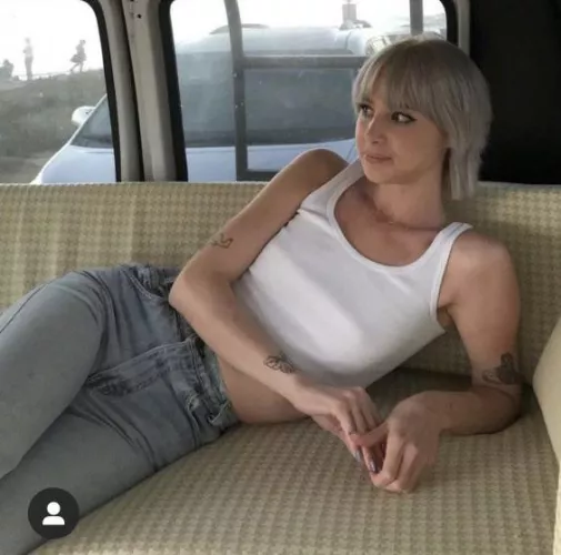 White tank top and tattoos