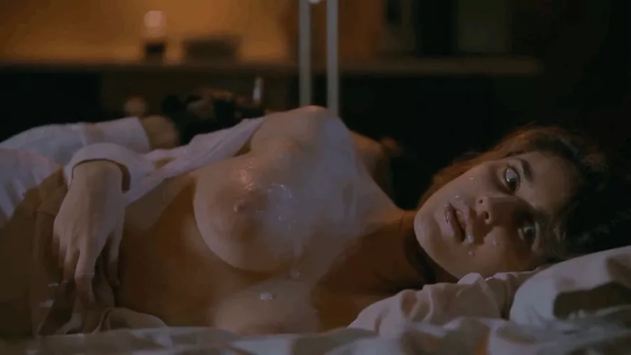 Any idea where this might be from? It seems like a real movie? She pulls the condom out and spreads the cum on herself.