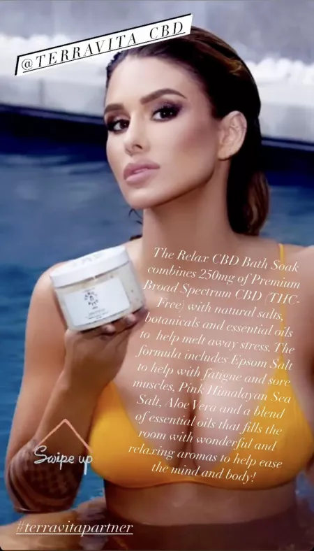 Even when she’s shilling her crap, she still shows off those amazing tits