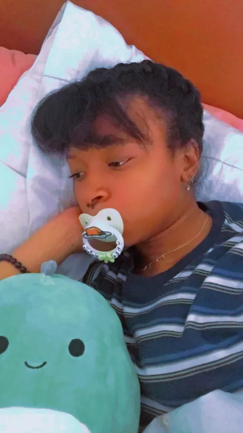 Hanging with Arlie...it’s been rough...and my paci ripped after taking this photo. Being big is hard.