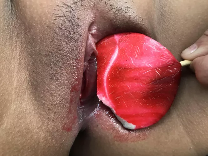Looks like my pussy took a big bite of my red lollipop, hehe…!