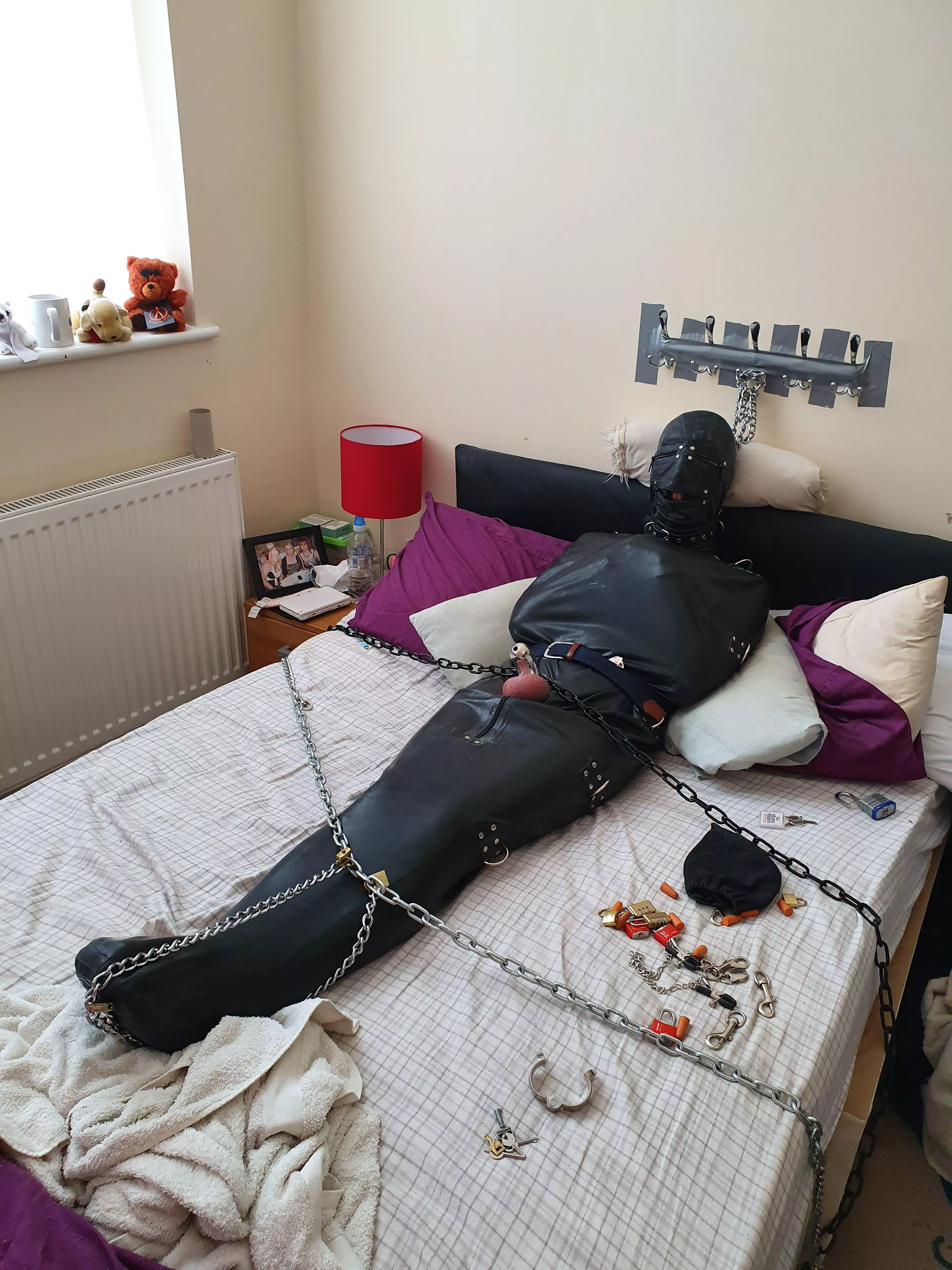 Me all sleepsacked in rubber suit, chained & padlocked & handcuffed & collared & gagged in chastity for god knows how long while my partner was at work with the keys ;) Me all sleepsacked in rubber suit, chained & padlocked & handcuffed & collared & gagged in chastity for god knows how long while my partner was at work with the keys ;)