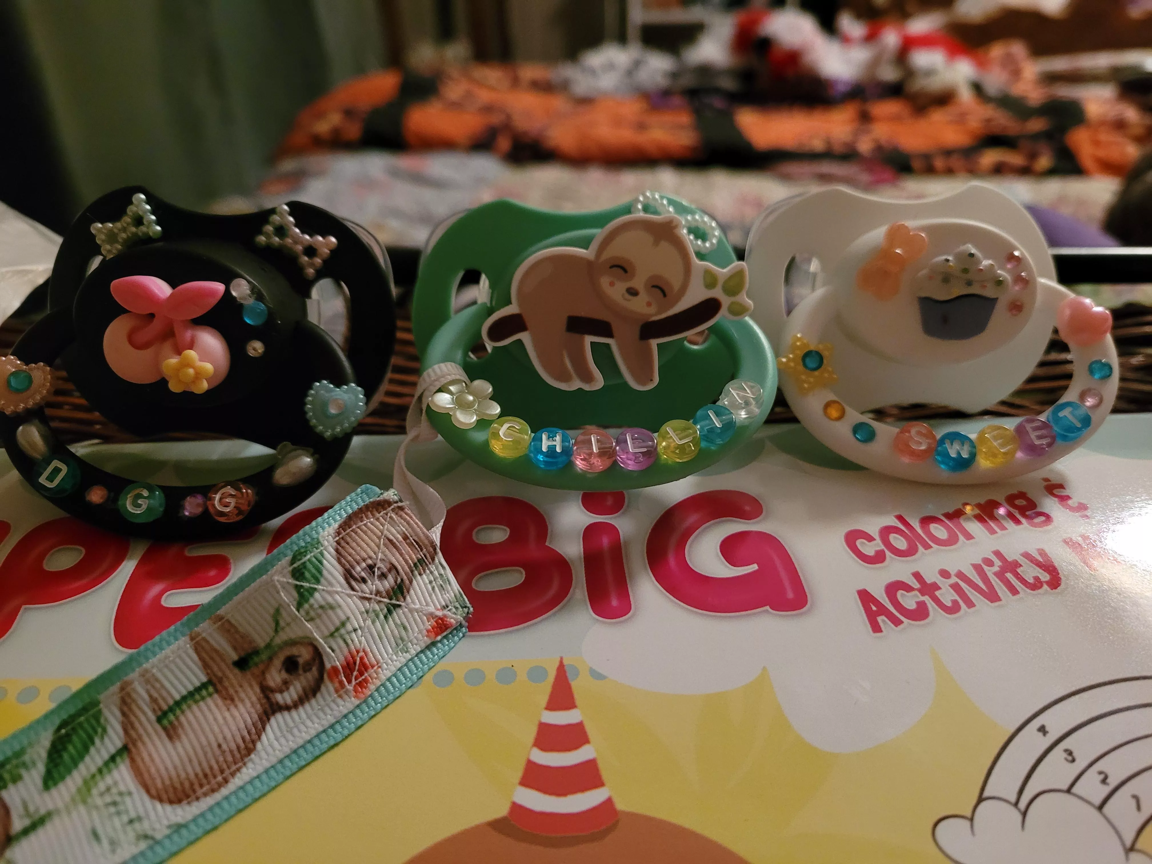 My new paci's. I made the cupcake one and Daddy made the cherry one. Funny daddy says he wants to make me a couple more. My new paci's. I made the cupcake one and Daddy made the cherry one. Funny daddy says he wants to make me a couple more.