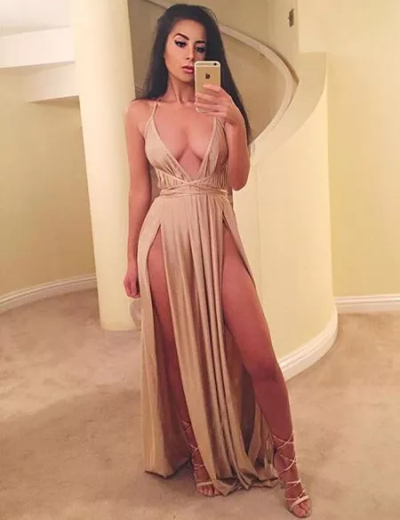 Plunging neckline and double high slit