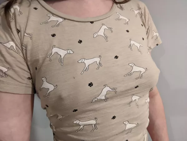 Poking through my dog shirt