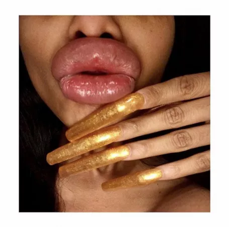 Ruby Sunset’s swollen duck pout