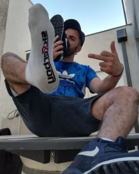 “Scally lad with attitude smelling his shoe” ...