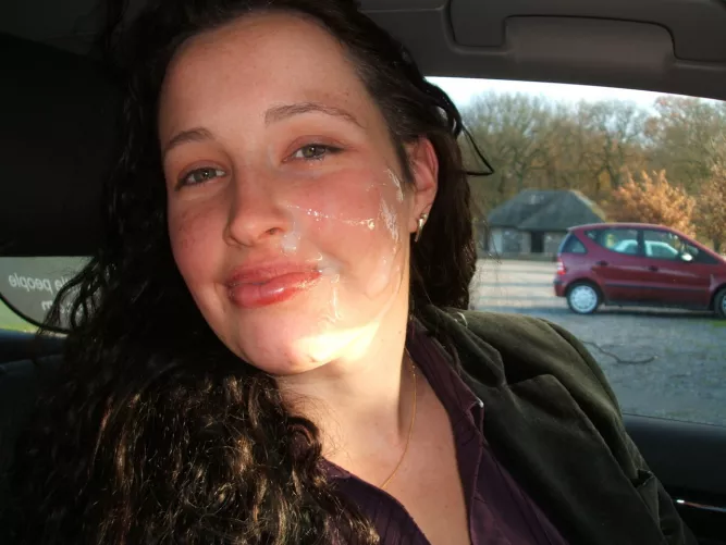 She Is happy with her beauty cream on her face...