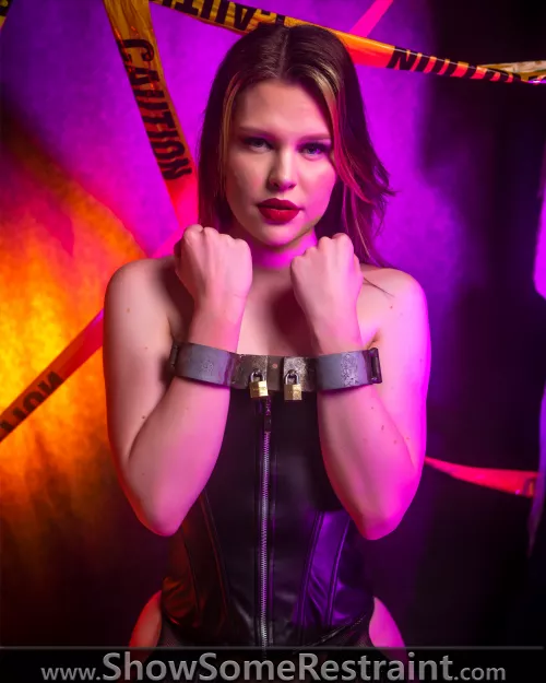 Steffi in some heavy steel cuffs/shackles