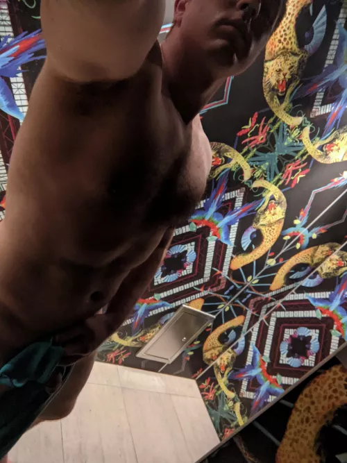 The showers at the gym are brightly colored