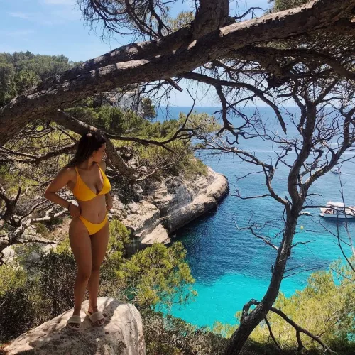 Yellow bikini and the blue sea